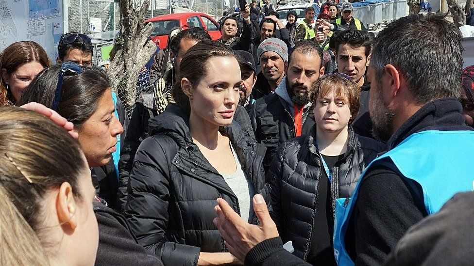 Angelina Jolie with refugees