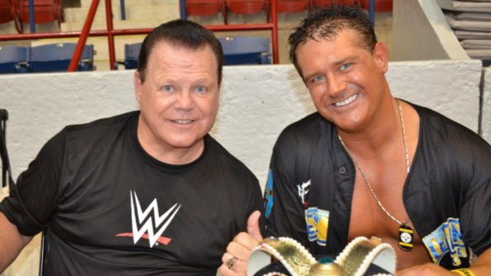 Jerry Lawler poses for a photograph with his son Brian