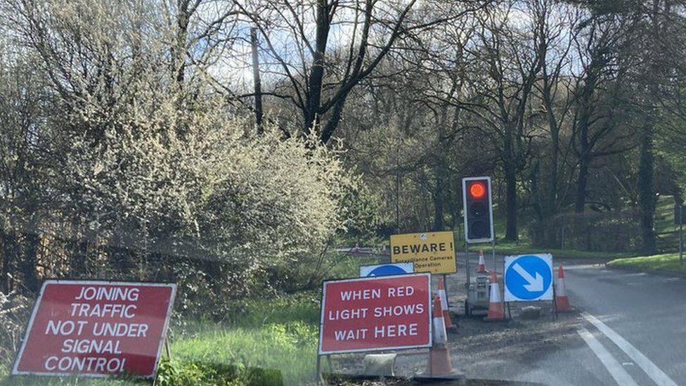 Temporary lights and signage on A30