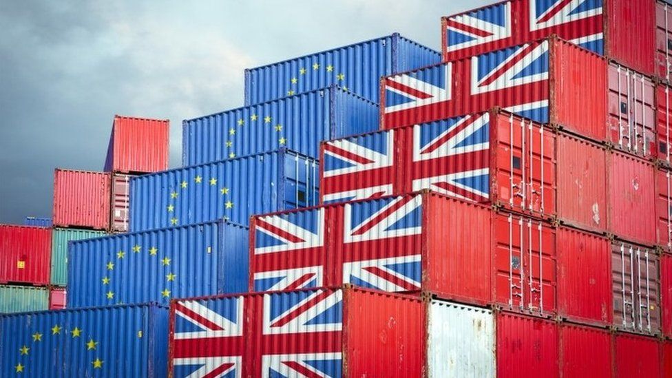 Containers bearing the Union Jack and the EU flag