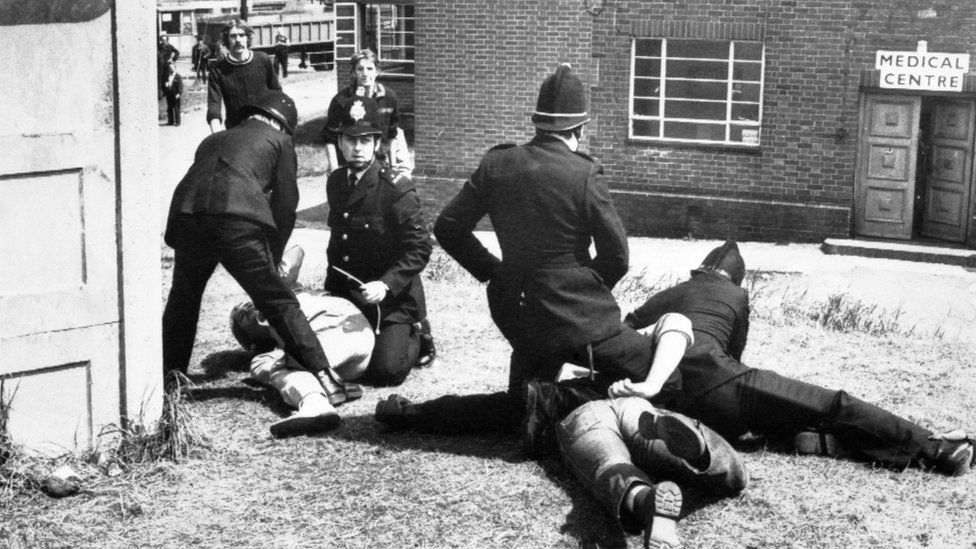 Police officers restrain striking miners at Orgreave Coking Plant, at Rotherham, in May 1984
