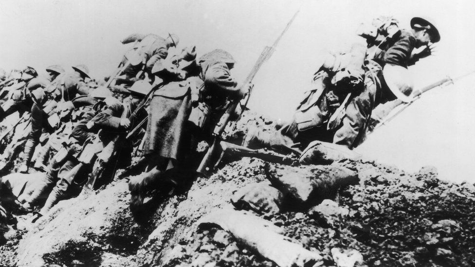 British troops climbing from their trench on the first day of 'The Big Push' on the Somme during World War One
