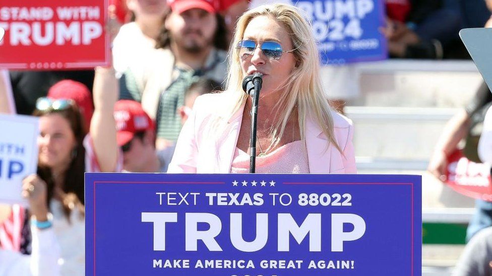 Marjorie Taylor-Greene speaks to the crowd during the Trump rally