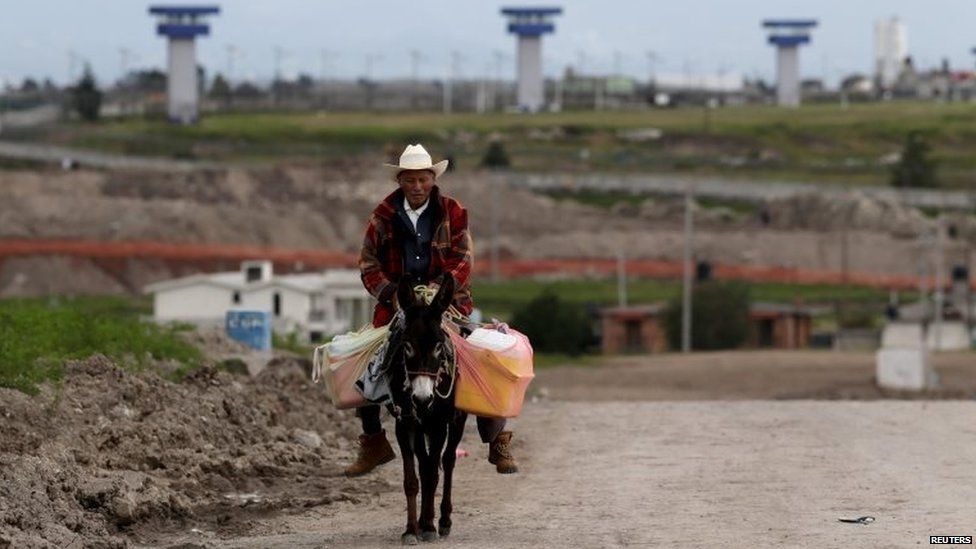 A man rides his donkey on 12 July 2015 near the Altiplano Federal Penitentiary from which drug lord Joaquin "El Chapo" Guzman escaped.