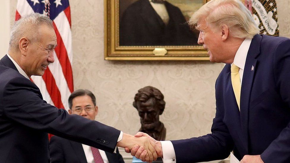 U.S. President Donald Trump shakes hands with Chinese Vice Premier Liu He