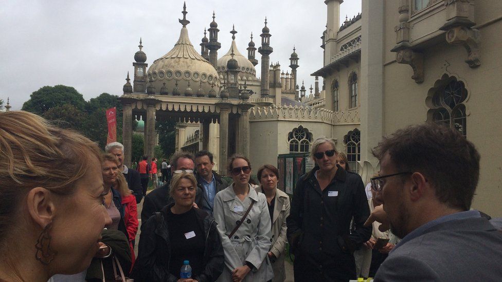 Kevin Newman leads a business history tour in Brighton