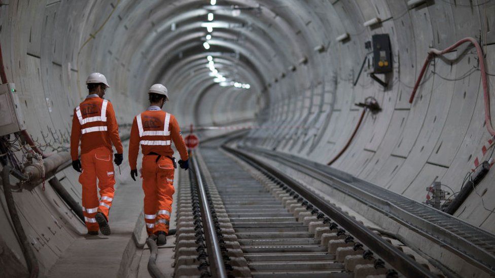 Crossrail engineers inspect the completed track as the Crossrail project celebrates the completion of the Elizabeth line track, on September 14, 2017 in