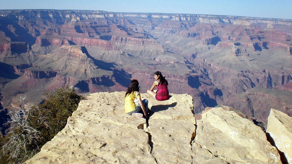 People looking at the Grand Canyon