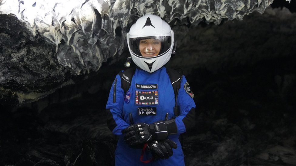 M.Musilova exploring a lava tube while outside the simulated spacecraft