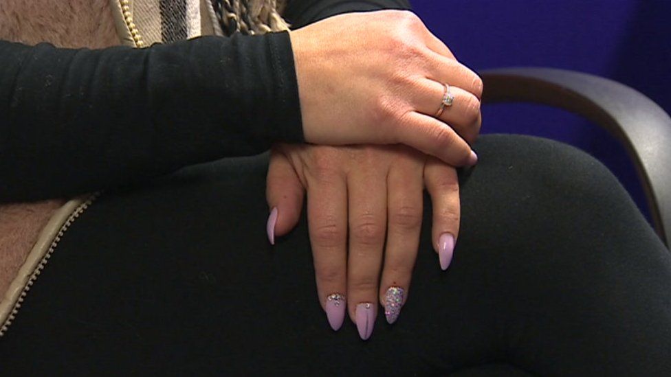 Hands of domestic violence victim 'Lucy'