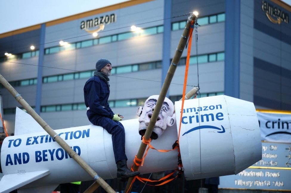 Extinction Rebellion protests outside the Amazon fulfillment center in Tilbury