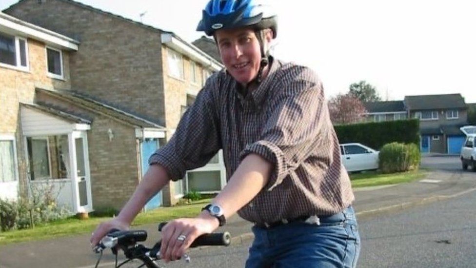 Julieann Cobbold riding a bicycle before her knee operation in 2012