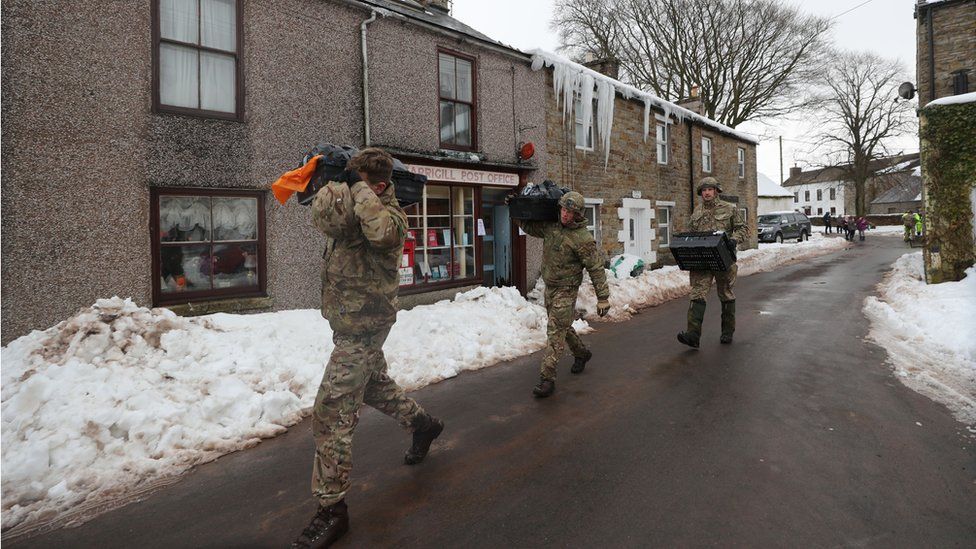 Soldiers delivering supplies to parts of Cumbria