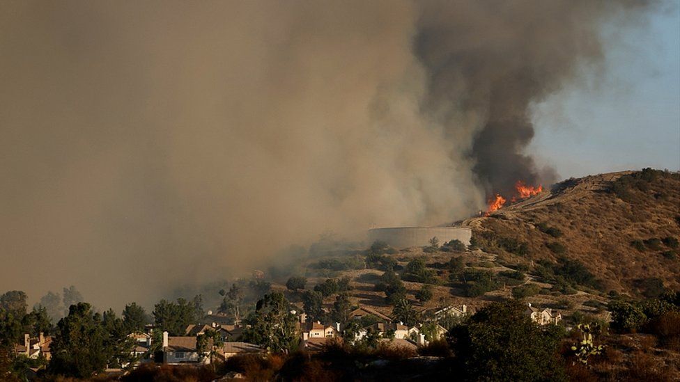 Smoke rises from the Silverado Fire near Lake Forest, California, October 27, 2020