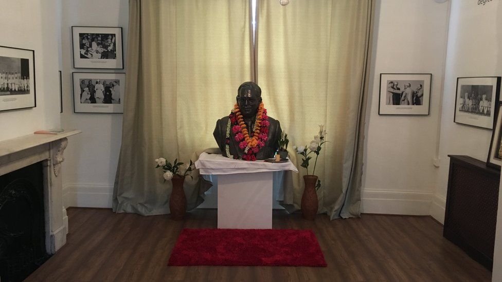 A large bust of Dr Ambedkar placed on a table inside the house in Primrose Hill