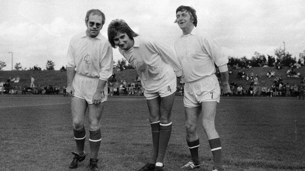 Michael Parkinson (right) taking part in a charity football match with Elton John and Rod Stewart in 1974