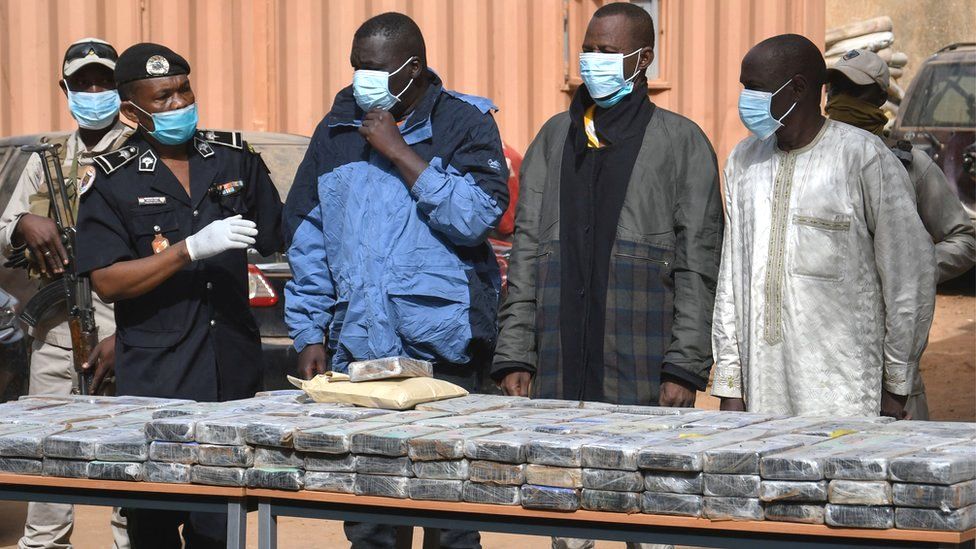 The seized cocaine is seen on a table at the premises of the Central Office for the Repression of Illicit Drug Trafficking in Niamey, 5 January 2022