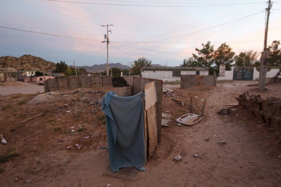 This sheltered pit latrine stands in a low-income neighbourhood in Ciudad Juarez, Mexico.