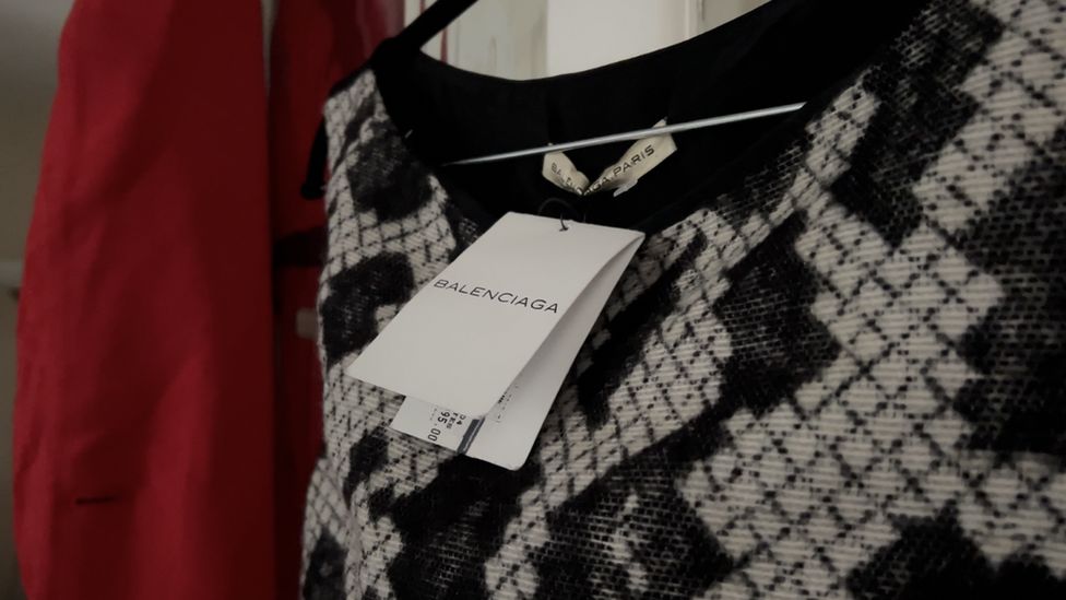 A dress with a label attached
