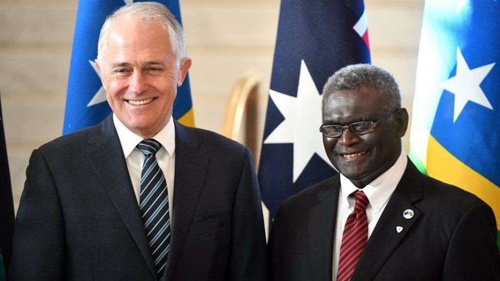 Malcolm Turnbull and Manasseh Sogavare appear before cameras in Canberra on Monday
