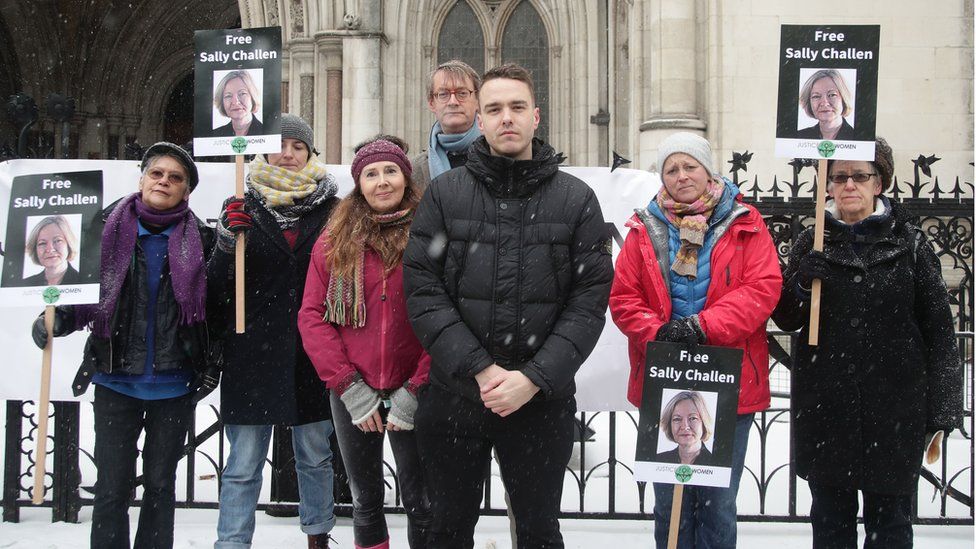 David Challen (centre) with members of Justice for Women protesting outside the Royal Courts of Justice