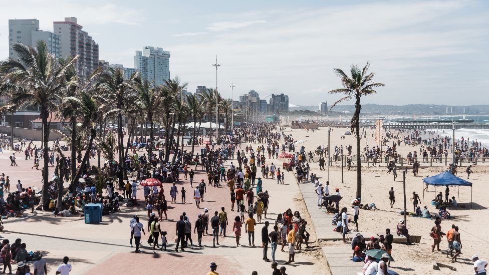 A general view shows thousands of New Year's day revellers and holidaymakers on a beachfront in Durban, South Africa - Saturday 1 January 2022