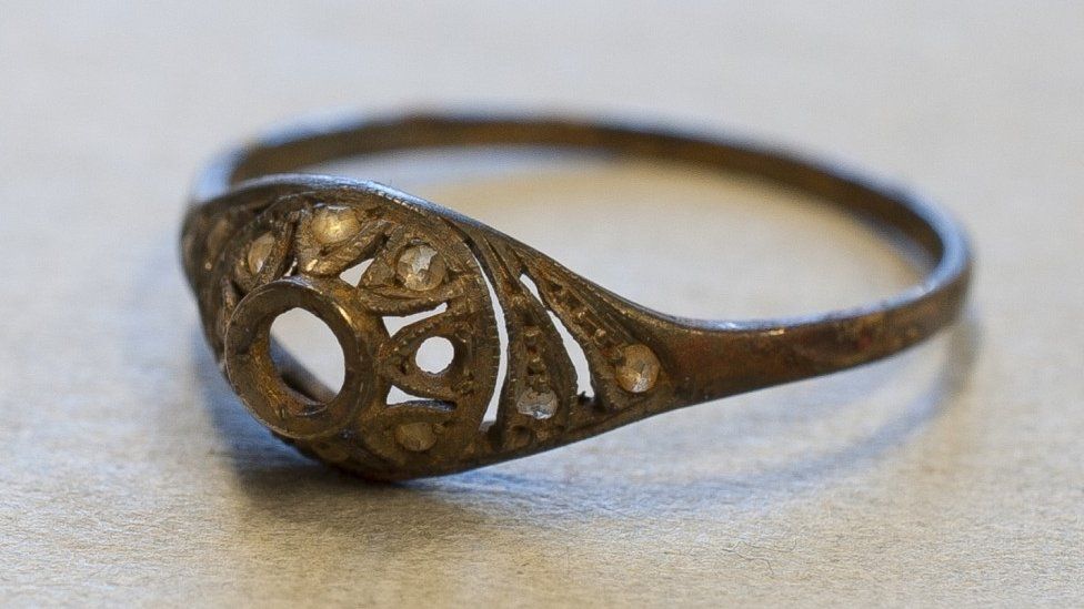 Ring found in the double-bottomed cup at the Auschwitz-Birkenau State Museum