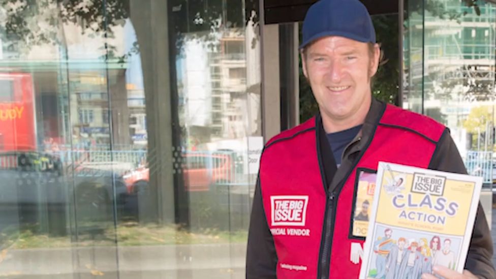 Clive outside the theatre selling the Big Issue