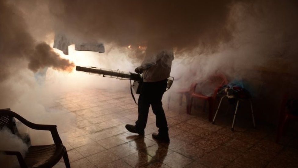 A health official fumigates a home in Soyapango, El Salvador. Photo: 21 January 2016