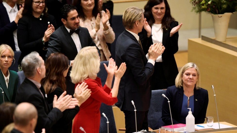 Swedish MPs clap as Magdalena Andersson is voted in as PM