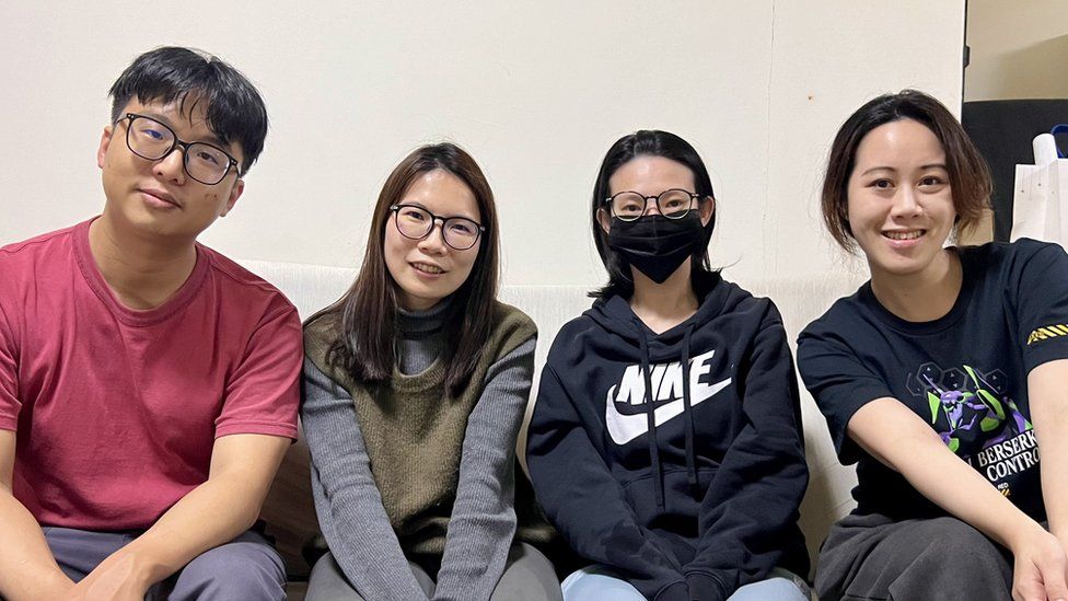 Ziwei (second left) with her husband and flatmates