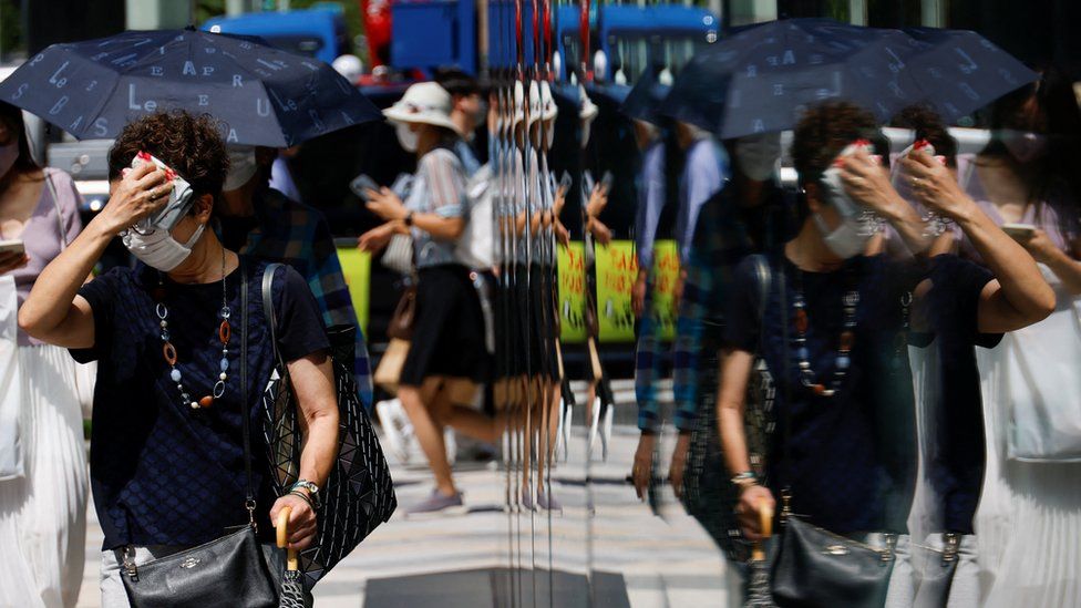 Japan swelters in its worst heatwave ever recorded - BBC News