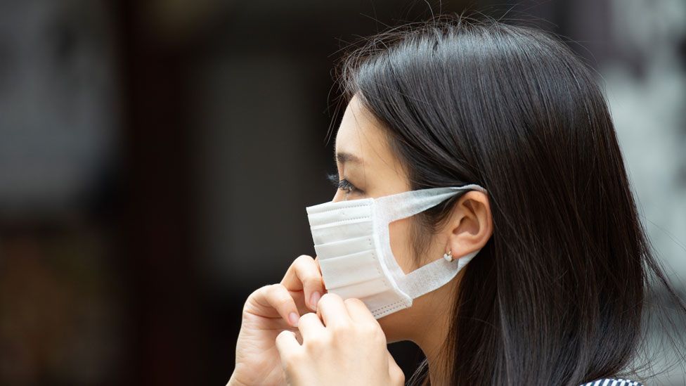 Asian woman with face mask