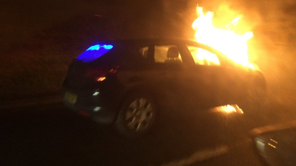 Unmarked police car catches fire on M8 in Glasgow - BBC News