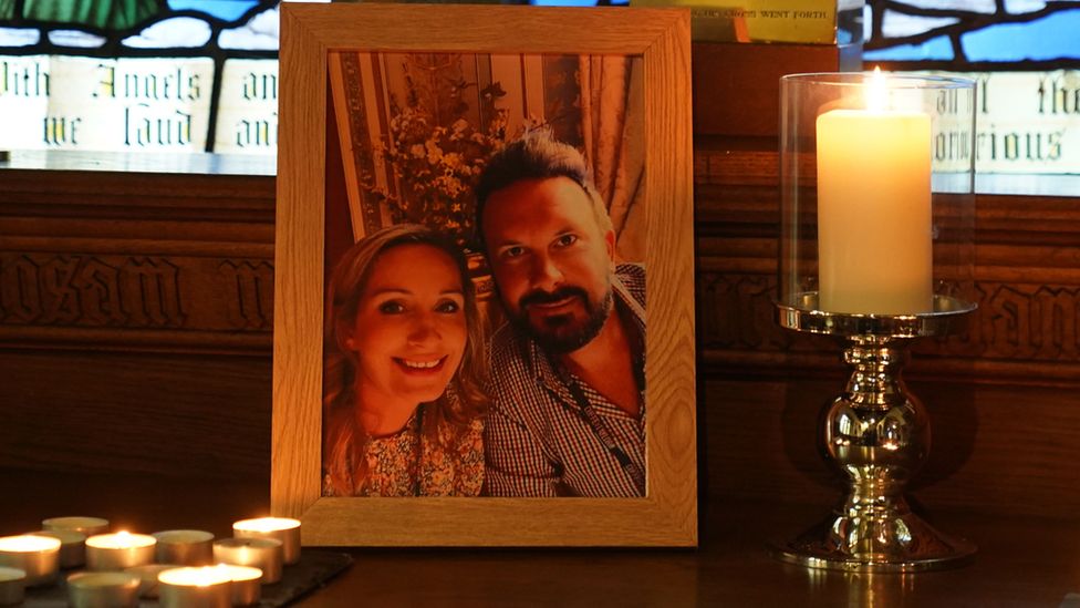 Candles are lit around a photo of Nicola Bulley (left) and her partner Paul Ansell on an altar at St Michael's Church