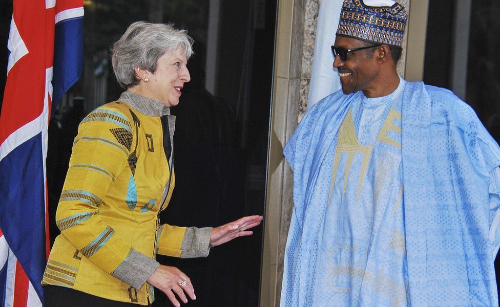 UK leader Theresa May greeting Nigerian President Muhammadu Buhari in Abuja, Nigeria - Wednesday 29 August 2018