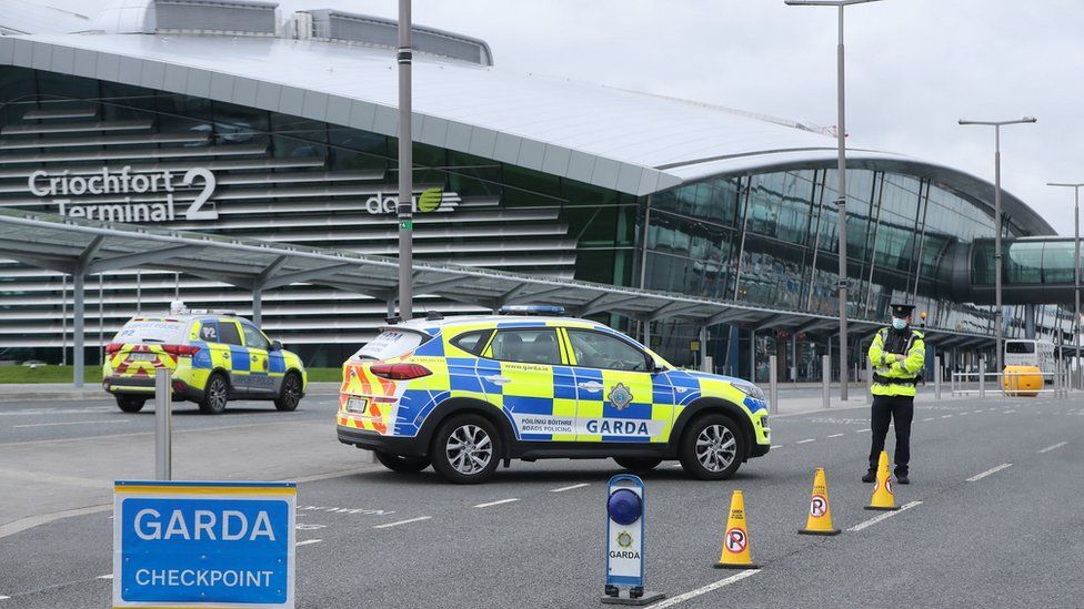 Garda perform Covid-19 stop checks outside Terminal 2 at Dublin Airport