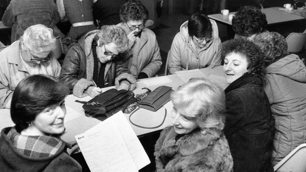 Berlei bra factory workers in Ebbw Vale fill in job application forms after losing their jobs in 1986