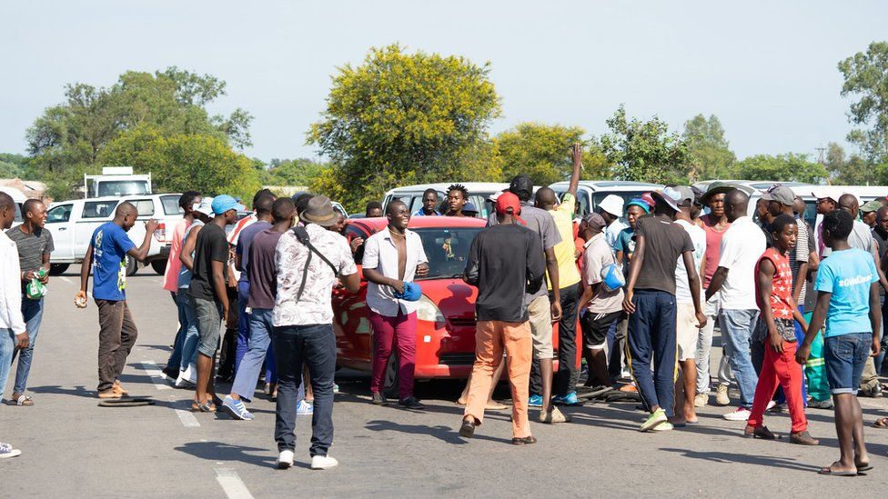 Protesters in Bulawayo block the road leading to the city demonstration