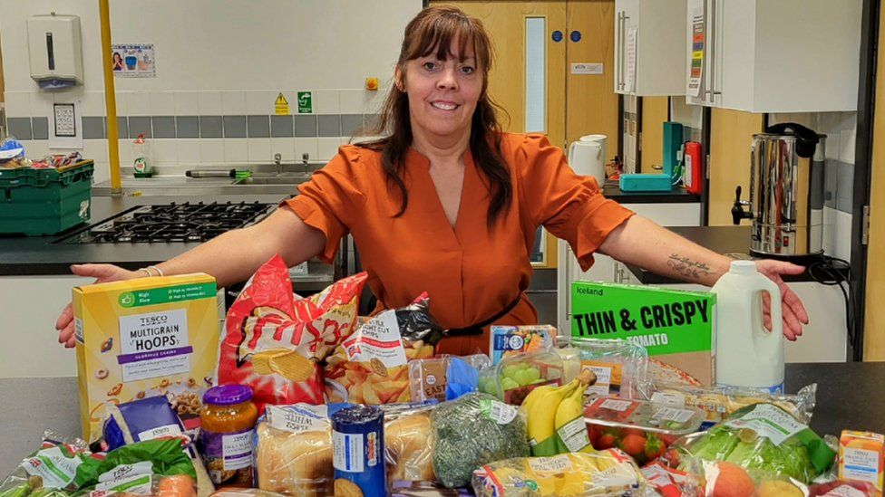 Michaela Martindale with a food parcel they have been giving to Bedford families