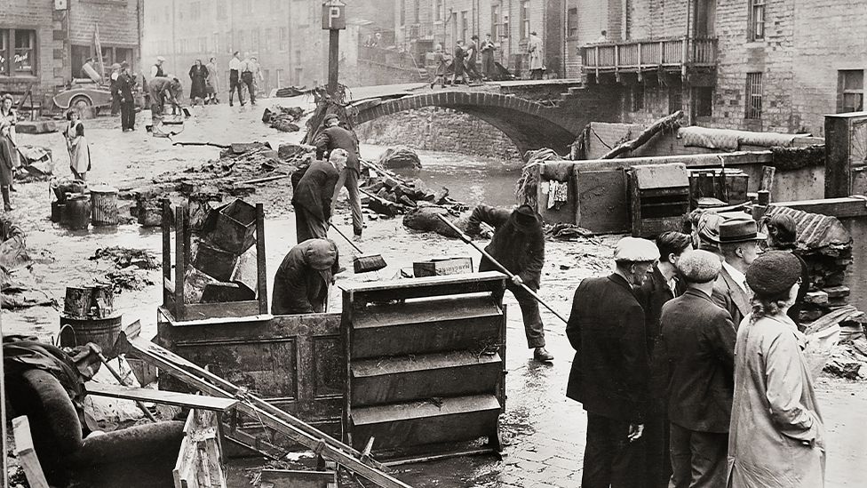 A clean-up takes place following the flood