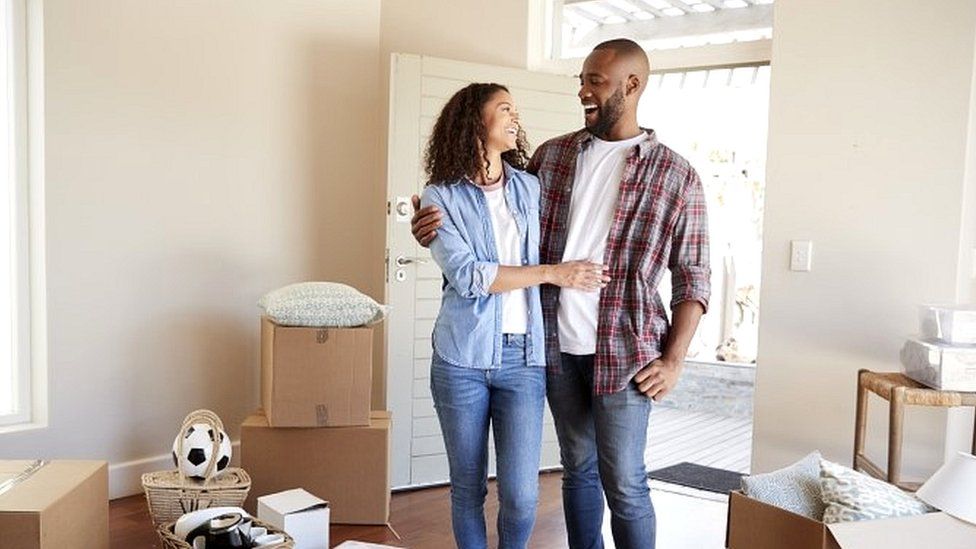 Couple move into new home