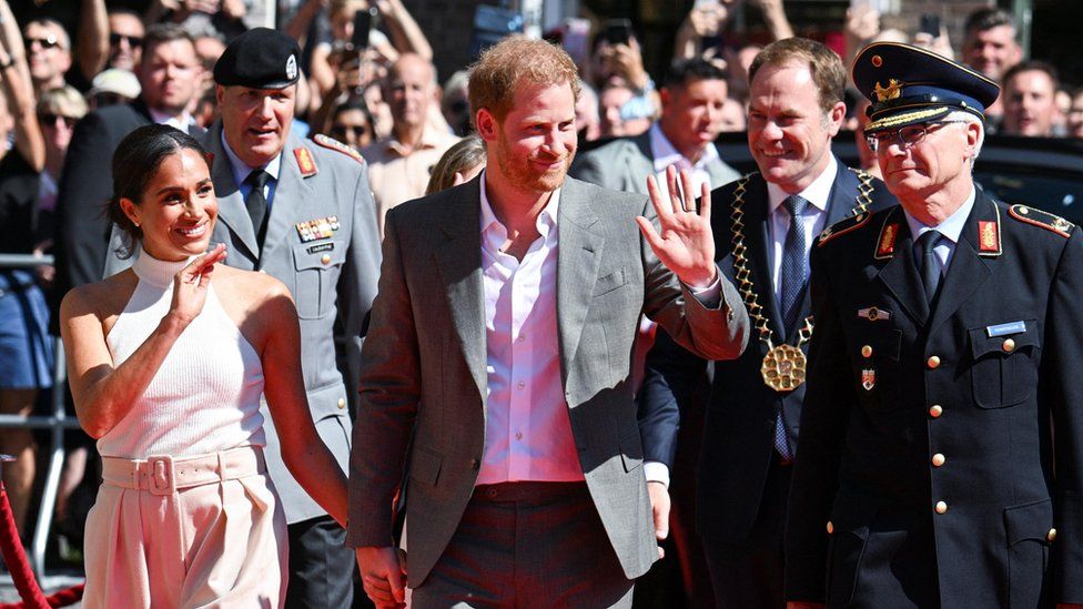 Meghan, Duchess of Sussex, and Prince Harry, Duke of Sussex, arrive at the town hall during an Invictus Games event in Dusseldorf
