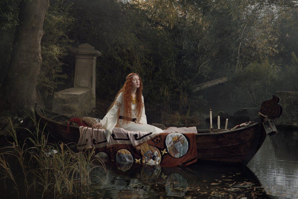 A recreation of 'the Lady of Shalott' by Julia Fullerton-Batten.