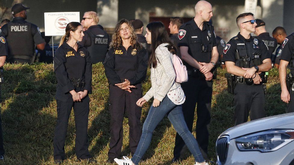 Marjory Stoneman Douglas High School staff, teachers and students return to school greeted by police and well wishers in Parkland, Florida on February 28, 2018