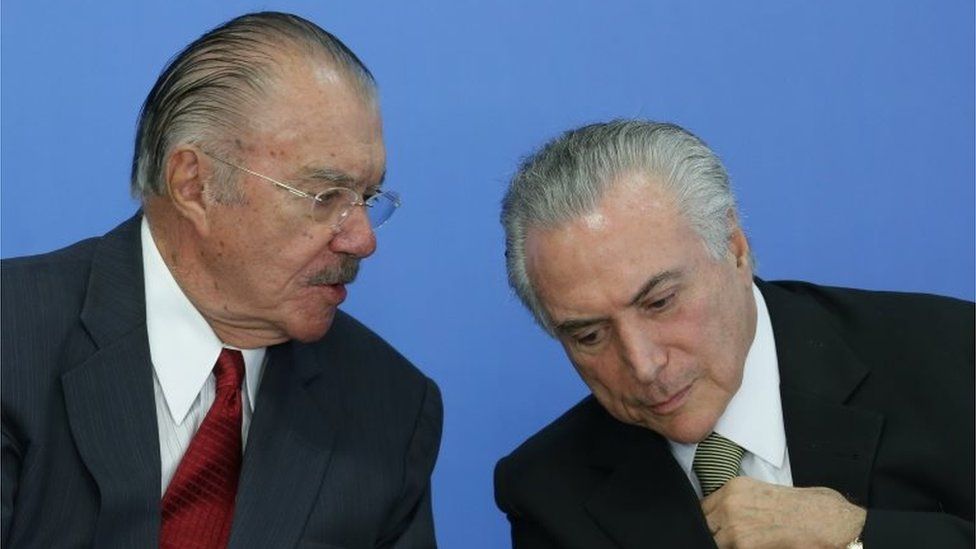 Brazil's acting President Michel Temer, right, listens to former President Jose Sarney during the swearing-in ceremony of the new Culture Minister Marcelo Calero at Planalto presidential palace in Brasilia, Brazil, Tuesday, May 24, 2016.