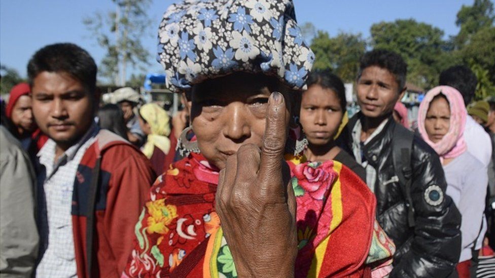 File photo of a voter displaying her finger marked with indelible ink after casting her vote at a polling station in the 2018 Mizoram assembly election