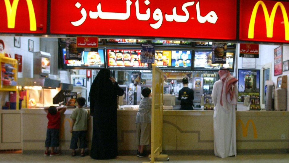 A segregation board separates women and families from men at a McDonalds restaurant in Riyadh. File photo