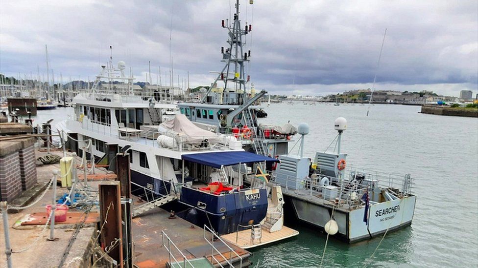 The intercepted yacht in port