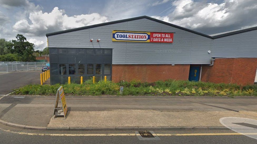 Brick and plastic-faced building on industrial estate